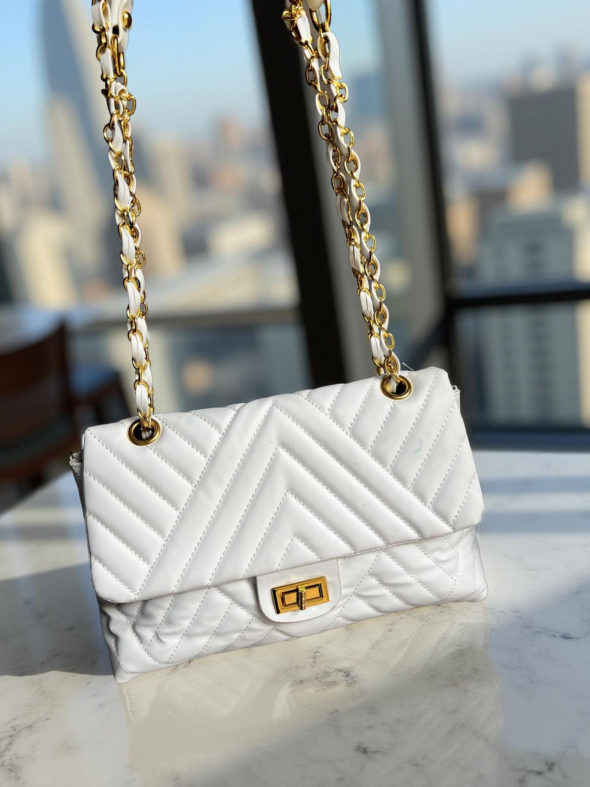 white medium sized shoulder bag