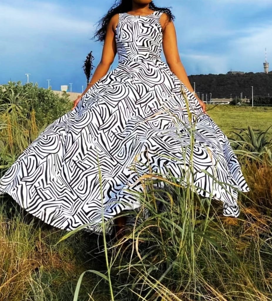 Black lined white sleeveless dress