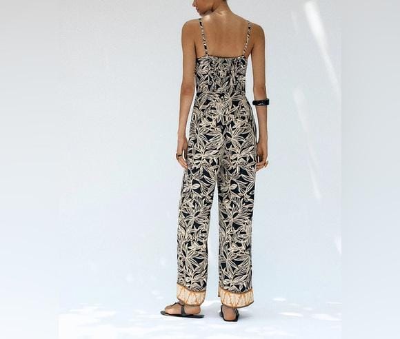 Floral strap flare leg jumpsuit