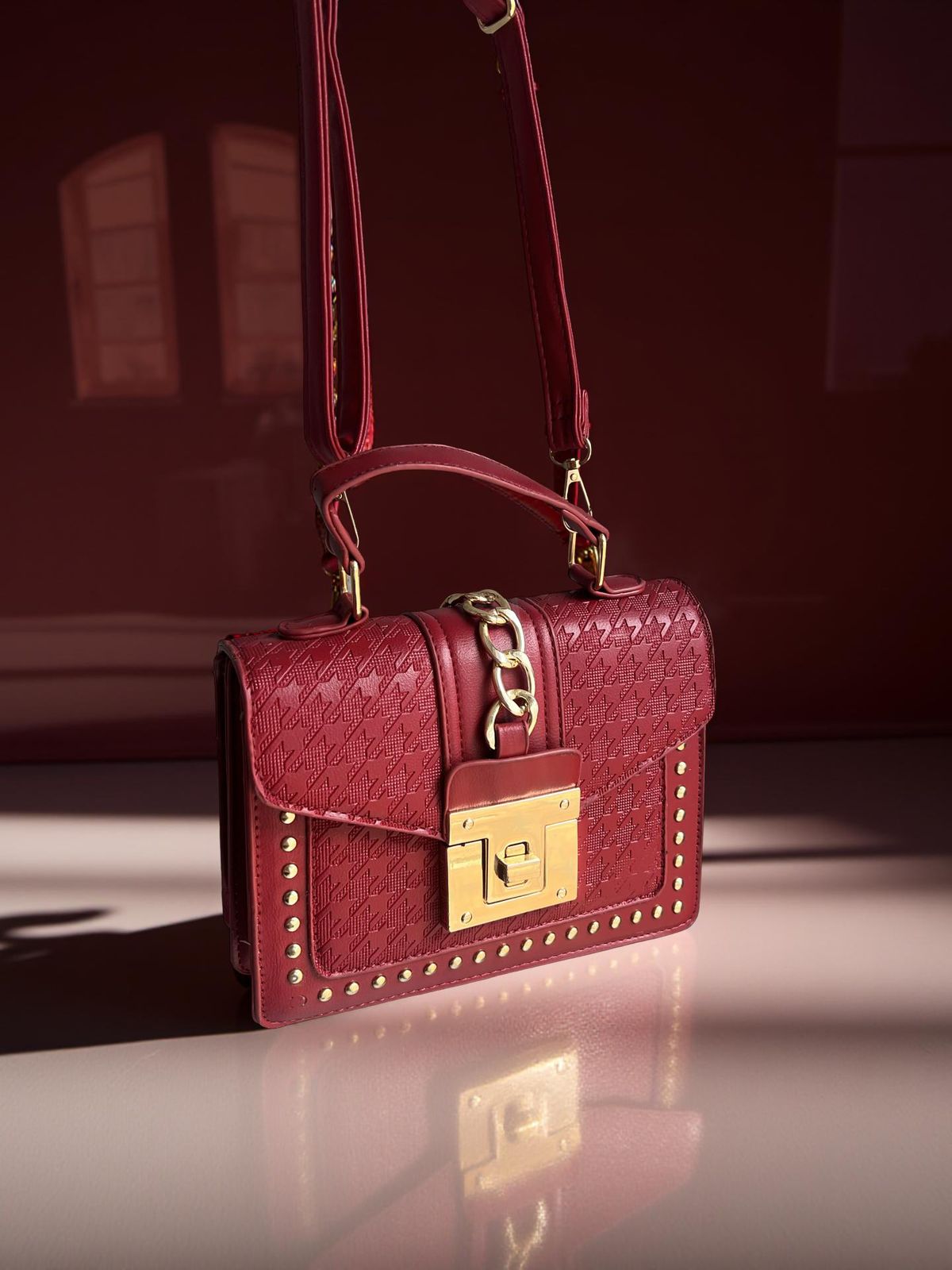 burgundy studded crossbody bag