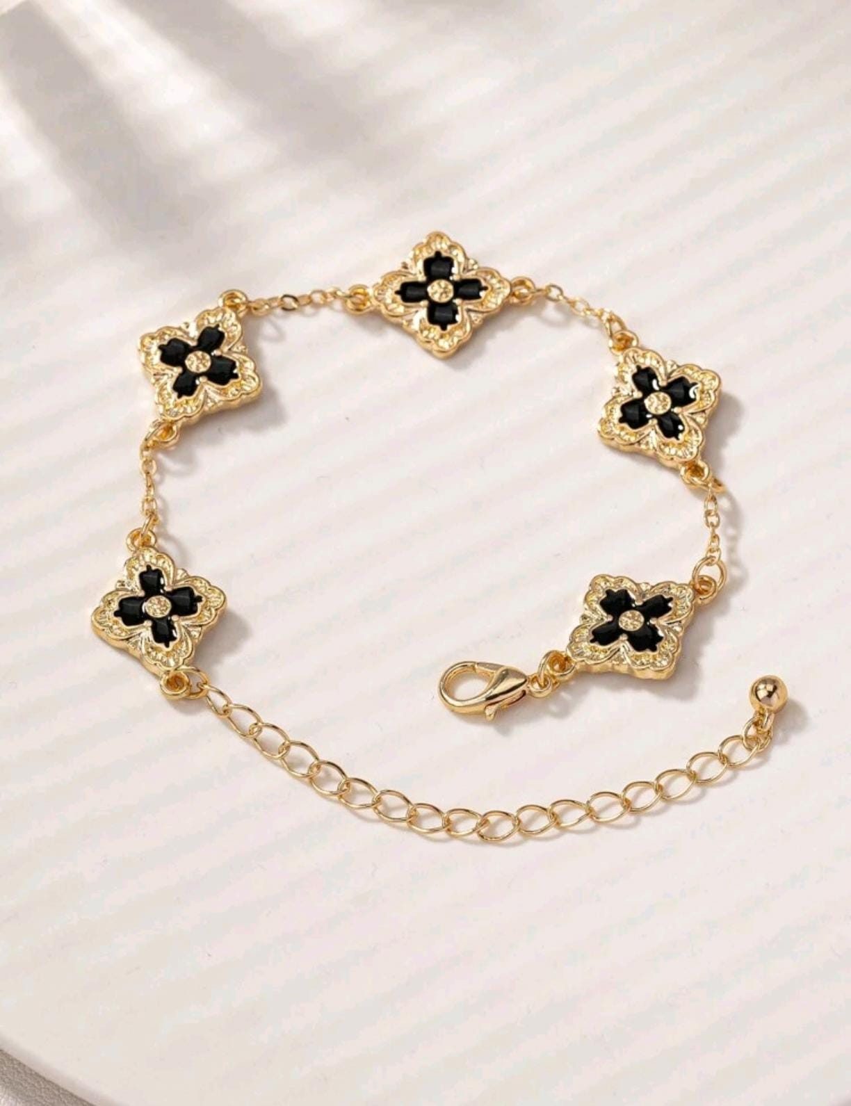 Black gold clover bracelet
