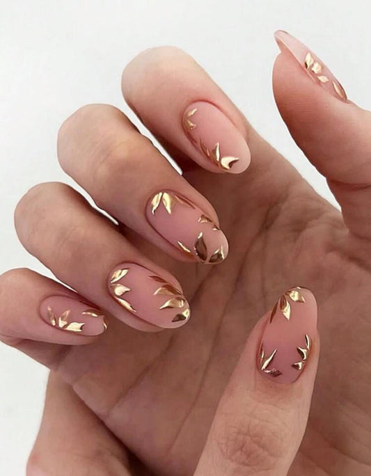 Medium almond fake nails Gold leaves french nails