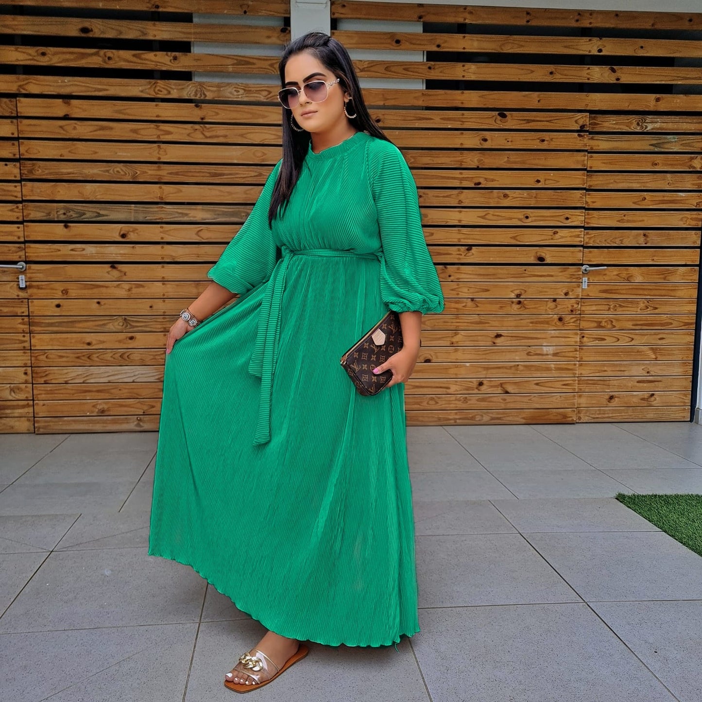 Long fine pleated dress.
