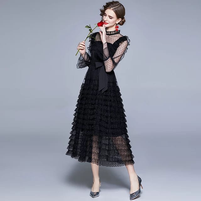 Gauze ruffle styled dress.