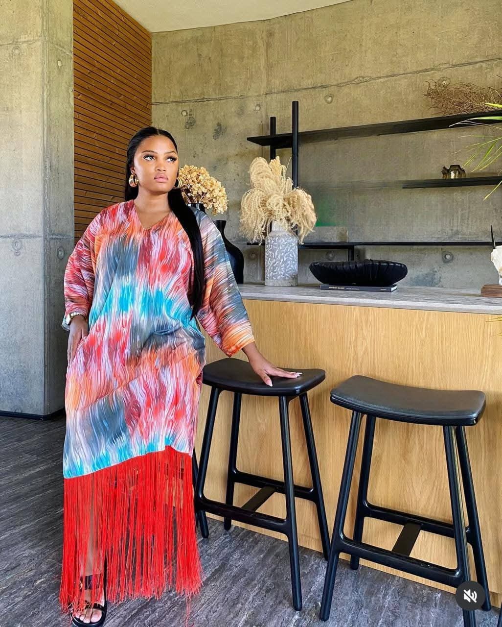 colorful dress with a v neck and half flare shoulders