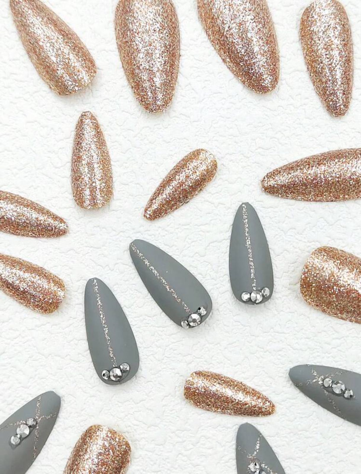 Almond shape nails gold glitter rhinestone