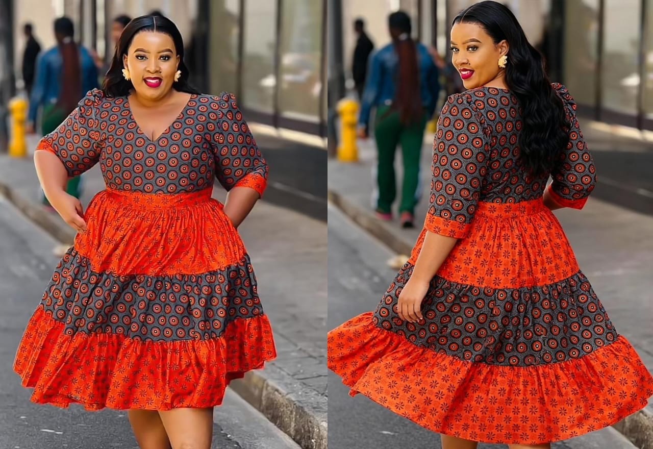 orange spotted circular design midi dress