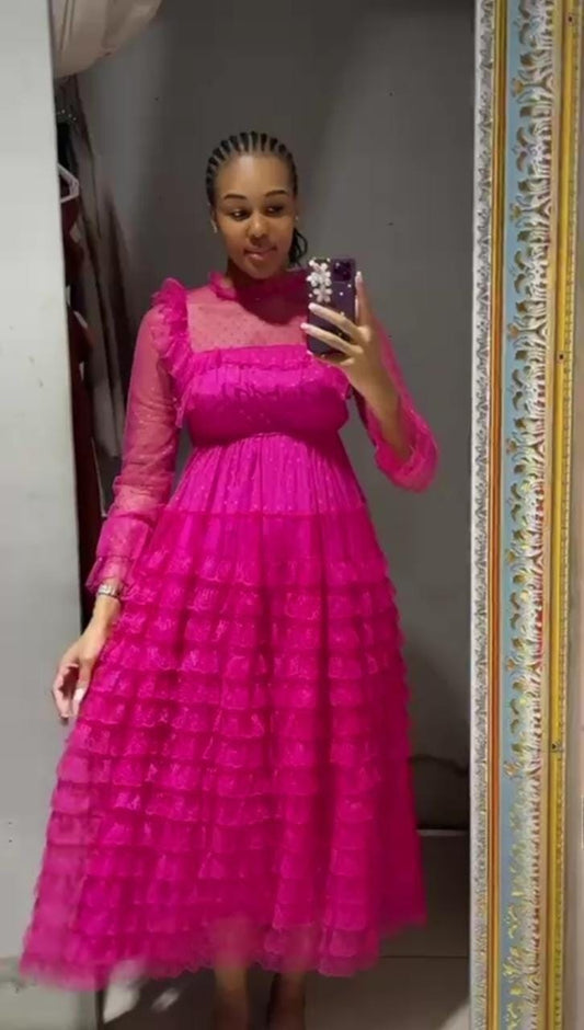 Gauze ruffle styled dress.