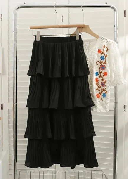 Pleated layered skirts